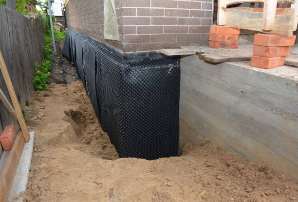 Happy homeowners after waterproofing job in Nottawa